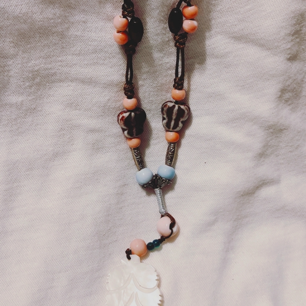 Shell and leather necklace
